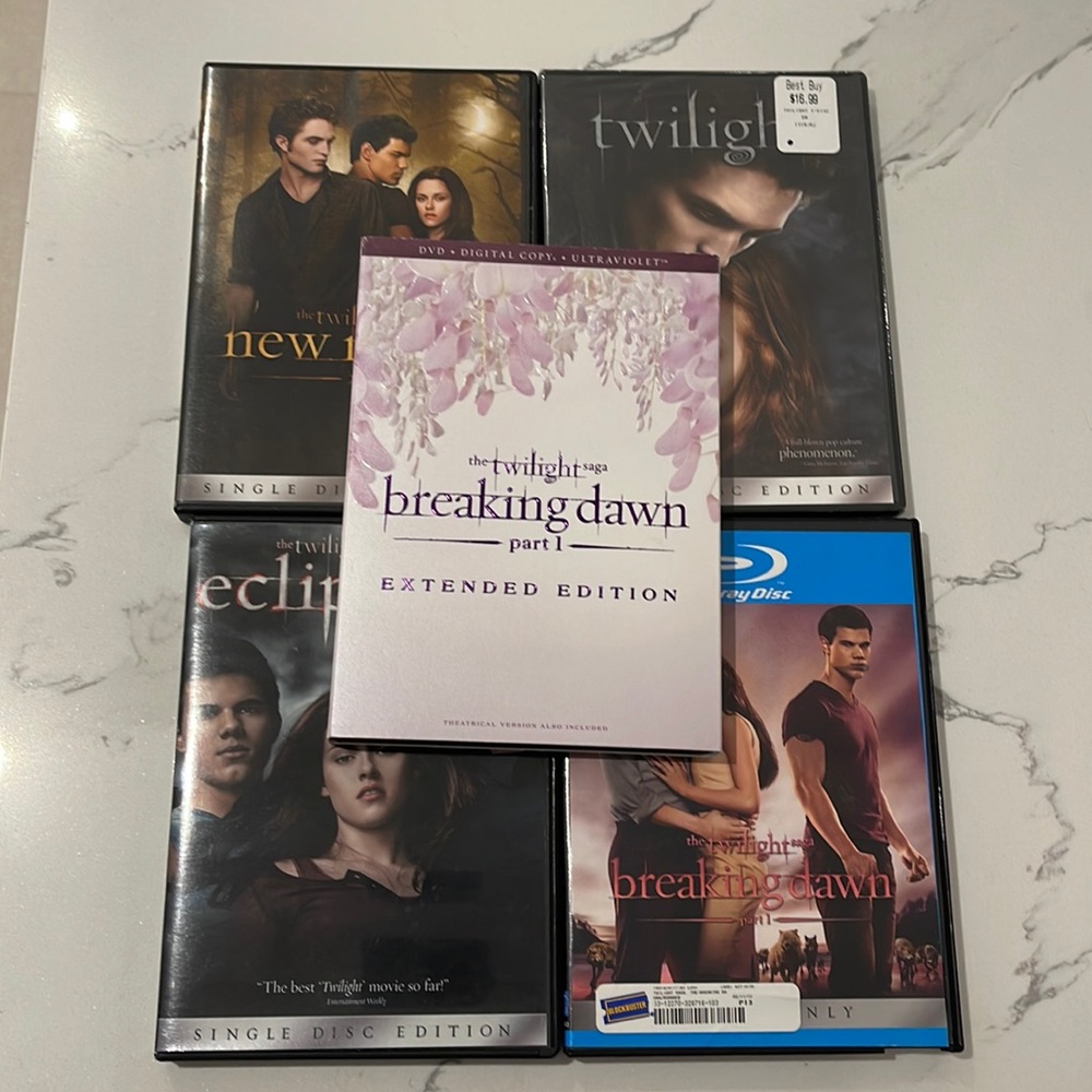 Twilight saga dvds and a blue ray bundle 5 movies